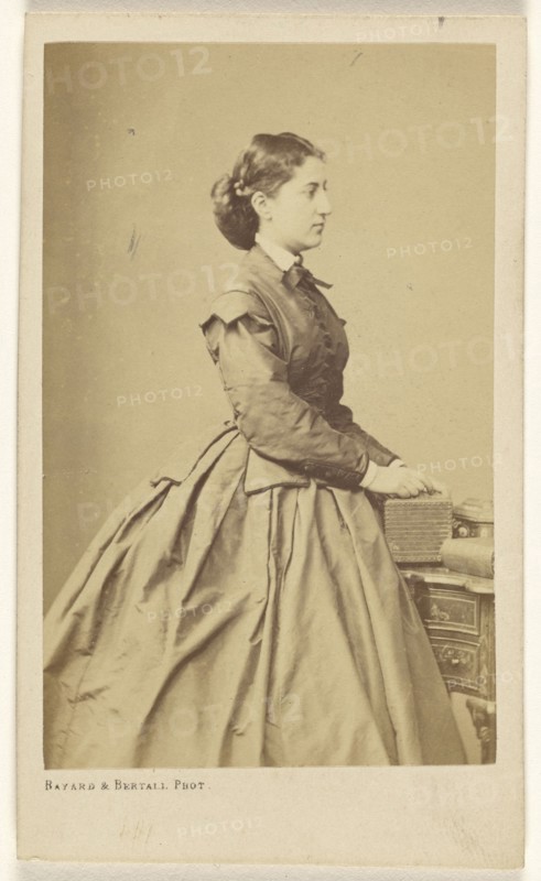 French woman in profile, standing; Bayard & Bertall; about 1862; Albumen silver print