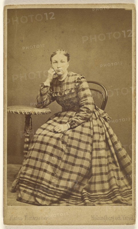 woman seated, with elbow on table, hand to cheek; Hanna Forthmeiier, Swedish, active 1860s - 1870s, 1865 - 1870; Albumen silver