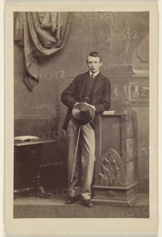 man holding a top hat and cane; Camille Silvy, French, 1834 - 1910, 1866; Albumen silver print