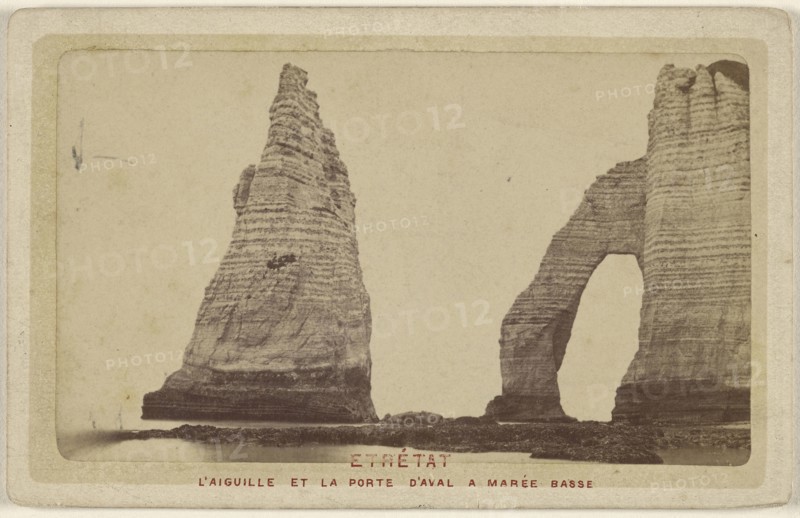 Etretat. L'Aiguille et La Porte D'Aval a Maree Basse; French; about 1877; Albumen silver print