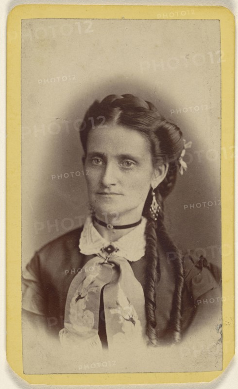 woman with two long curls, printed in vignette-style; E.J. Potter, American, active 1870s - 1890s, 1870 - 1875; Albumen silver