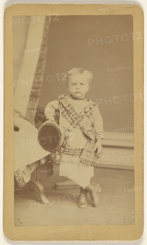 little boy standing, holding a cap; Fernando Dessaur, American, active 1880s, 1870 - 1875; Albumen silver print