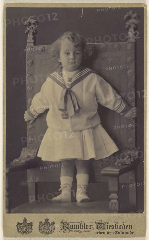 little girl standing in an ornate chair; Rumbler, German, active Wiesbäden, Germany 1860s - 1870s, 1875 - 1880; Carbon or
