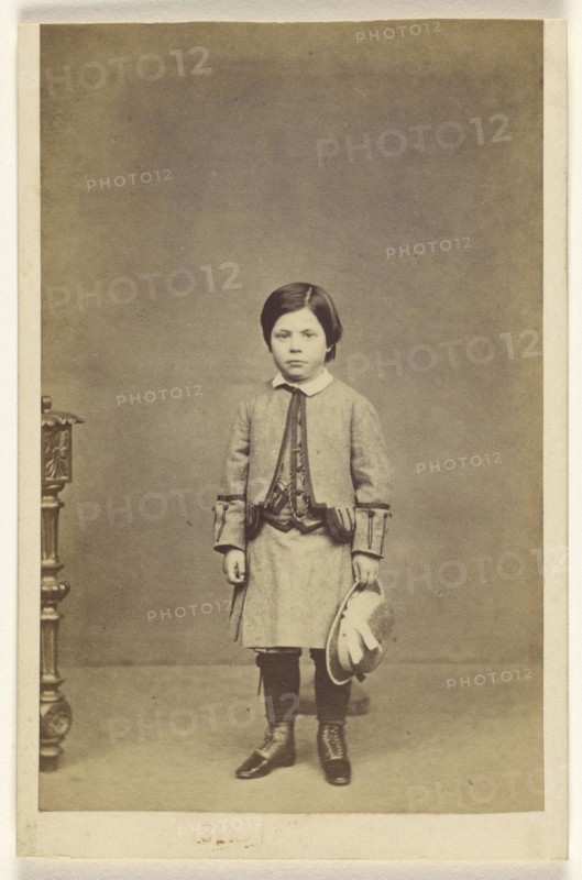 little girl standing, holding hat; A. Crowe, British, active 1860s - 1870s, about 1865; Albumen silver print