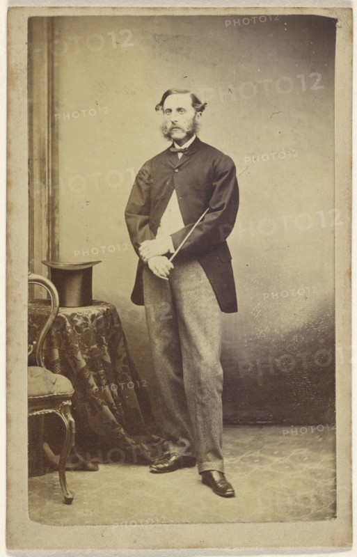 Man holding a cane under his arm; American; 1864 - 1865; Albumen silver print