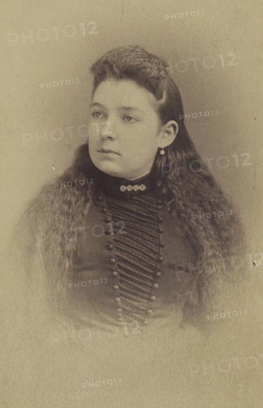 woman with long wavy hair, printed in vignette-style; Mayhew Brothers; 1870 - 1875; Albumen silver print