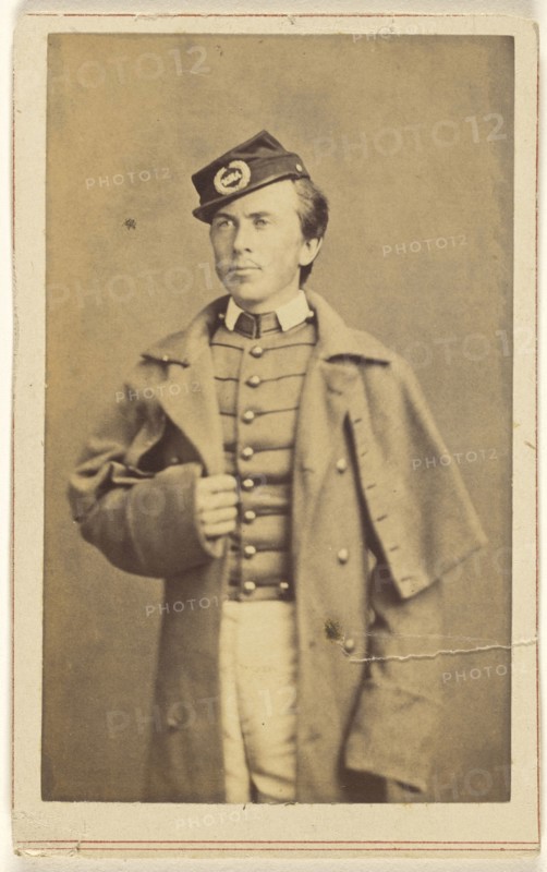 Civil War soldier standing, one hand grasping his overcoat; Charles DeForest Fredricks, American, 1823 - 1894, 1862; Albumen