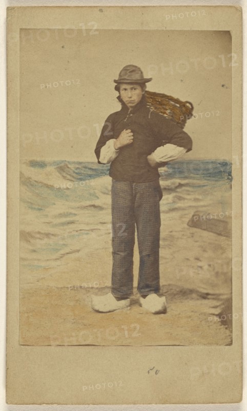 Dutch boy in front of painted sea background; Willem Frederik Vinkenbos, Dutch, 1831 - 1896, 1865 - 1875; Hand-colored albumen