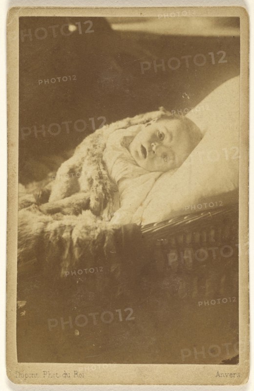 Paul 10 moins baby in a crib looking up out; J. Dupont, Belgian, 1818 - 1901, about 1870; Albumen silver print