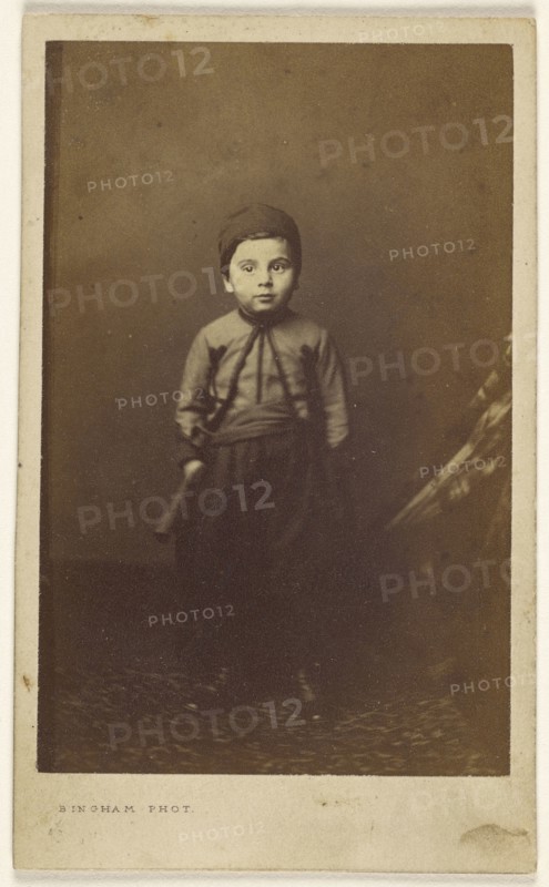 little boy in native costume, standing; Robert Jefferson Bingham, British, 1824 - 1870, about 1865; Albumen silver print