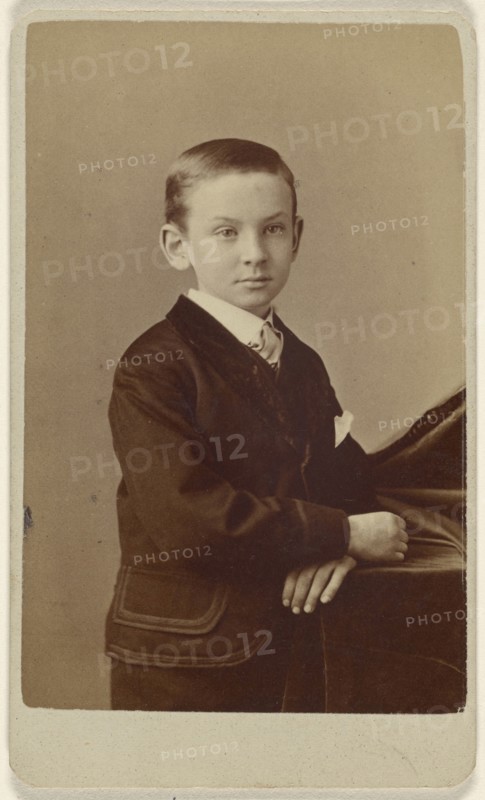 little boy standing, leaning on cloth-covered table; Alva Pearsall, American, 1838 - 1893, active Brooklyn, New York)