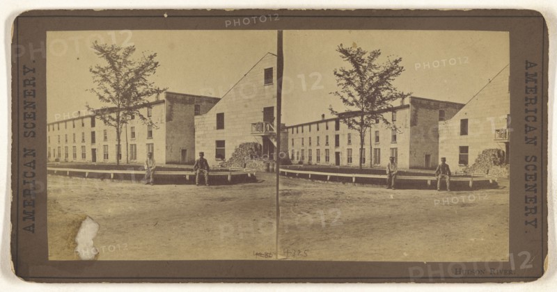 Hudson River. Two men sitting on a railing outside a large building complex; American; about 1870; Albumen silver print