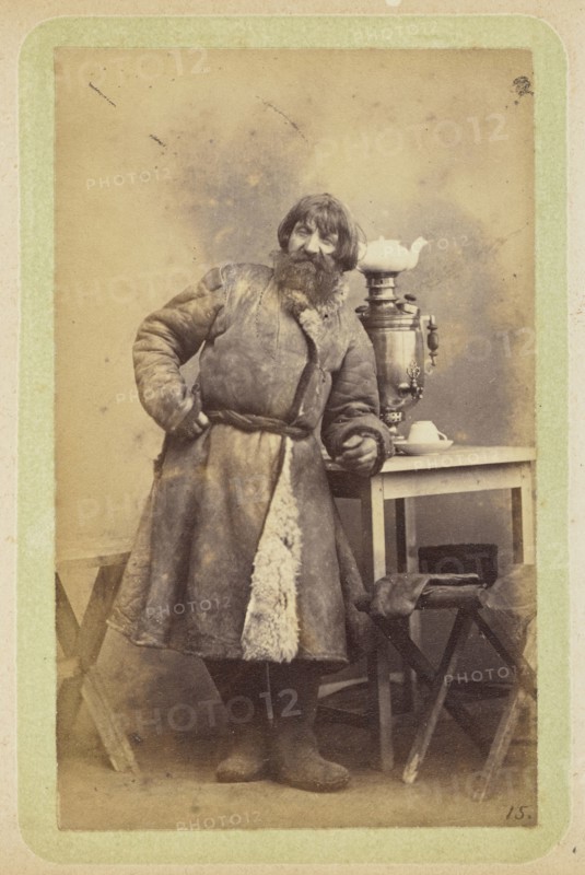 Man in coat leaning on table; William Carrick, Scottish, 1827 - 1878, Russia; about 1860 - 1870; Albumen silver print