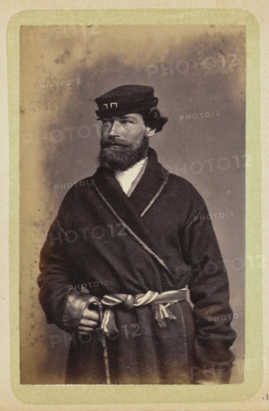 Man posing in dark coat and sash; William Carrick, Scottish, 1827 - 1878, Russia; about 1860 - 1870; Albumen silver print