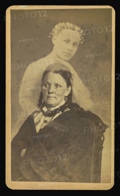 woman seated with a female  spirit  in background; William H. Mumler, American, 1832 - 1884, 1862 - 1875; Albumen silver print