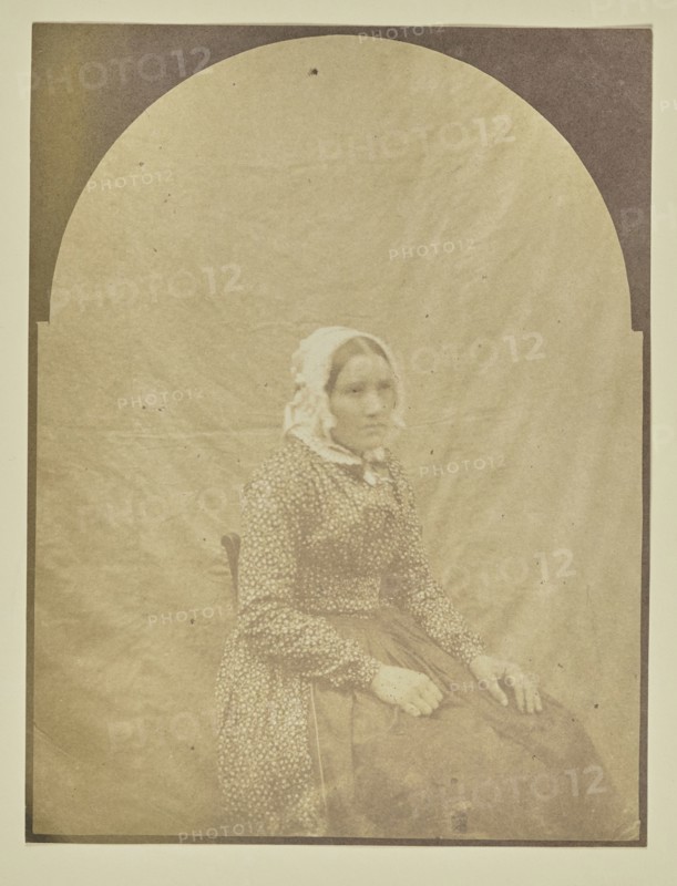 Portrait of seated woman with a bonnet; Hippolyte Bayard, French, 1801 - 1887, about 1840 - 1849; Salted paper print
