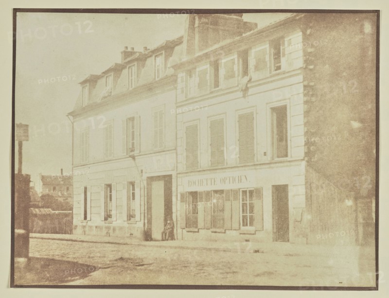 Man sitting outside optician's shop; Hippolyte Bayard, French, 1801 - 1887, France; about 1840–1849; Salted paper print