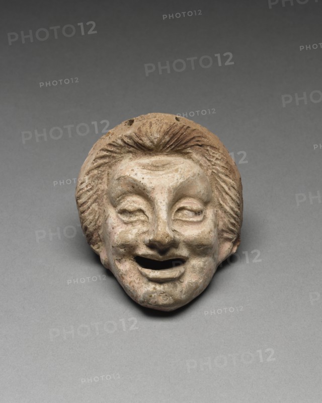 Young Man; Tarentum, Taras, South Italy; 300 - 200 B.C; Terracotta with white slip and polychromy, brownish red, pink