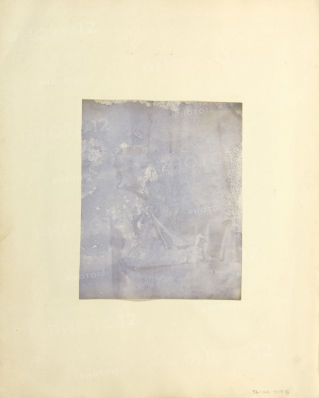 Profile portrait of a Seated Man Holding a Book; British, active India about 1843; India; 1843 - 1845; Salted paper print