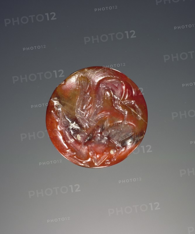 Lentoid engraved seal; Crete, Greece; about 1400 B.C. - 1300 B.C; Carnelian or jasper; 1.5 × 0.9 cm, 9,16 × 3,8 in