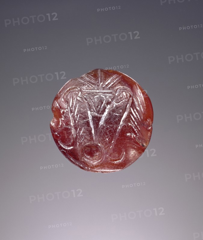 Lentoid engraved seal; Crete, Greece; about 1700 B.C. - 1450 B.C; Carnelian; 0.8 × 1.8 cm, 5,16 × 11,16 in