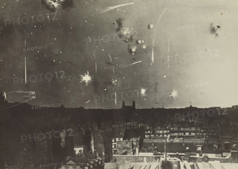 Bombs over low buildings; Fédèle Azari, Italian, 1895 - 1930, Italy; 1914 - 1919; Gelatin silver print; 11.8 x 12.3 cm