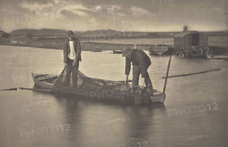 Taking Up the Eel-Net; Peter Henry Emerson, British, born Cuba, 1856 - 1936, London, England; 1886; Platinum print; 18.9 x 28.7