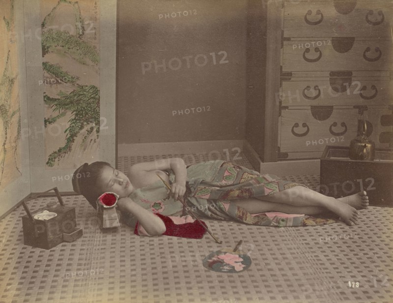 Woman Reclining with Pipe; Kusakabe Kimbei, Japanese, 1841 - 1934, active 1880s - about 1912, Japan; 1870s - 1890s