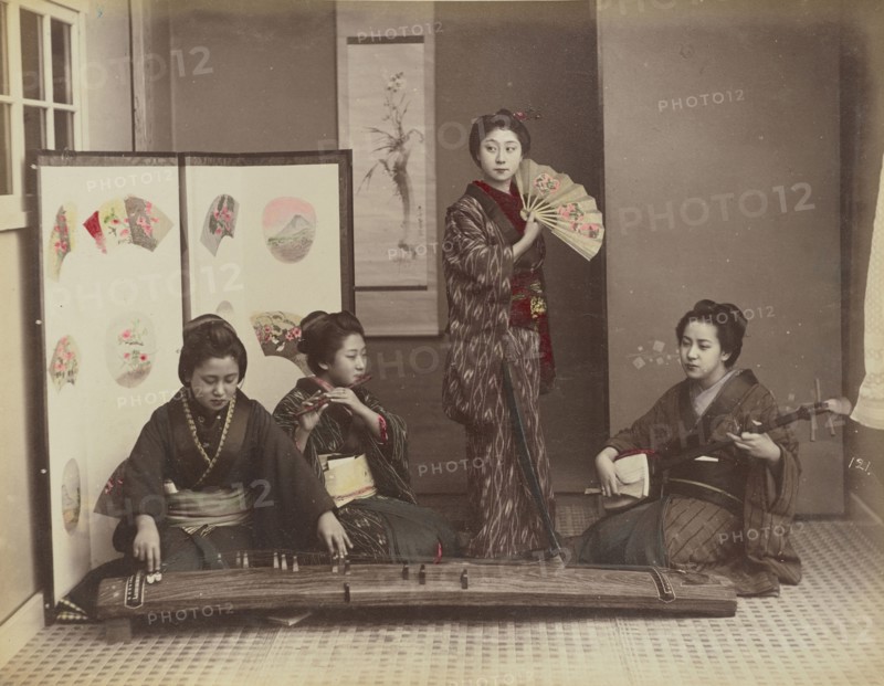Playing with Music; Kusakabe Kimbei, Japanese, 1841 - 1934, active 1880s - about 1912, Japan; 1870s - 1890s; Hand-colored