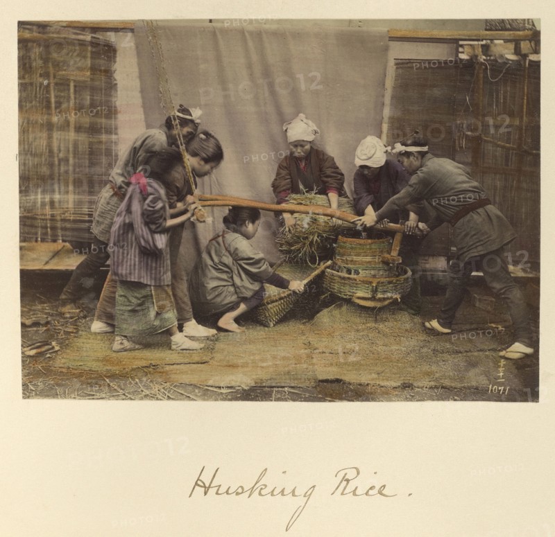 Husking Rice; Shinichi Suzuki, Japanese, 1835 - 1919, Japan; about 1873 - 1883; Hand-colored Albumen silver print