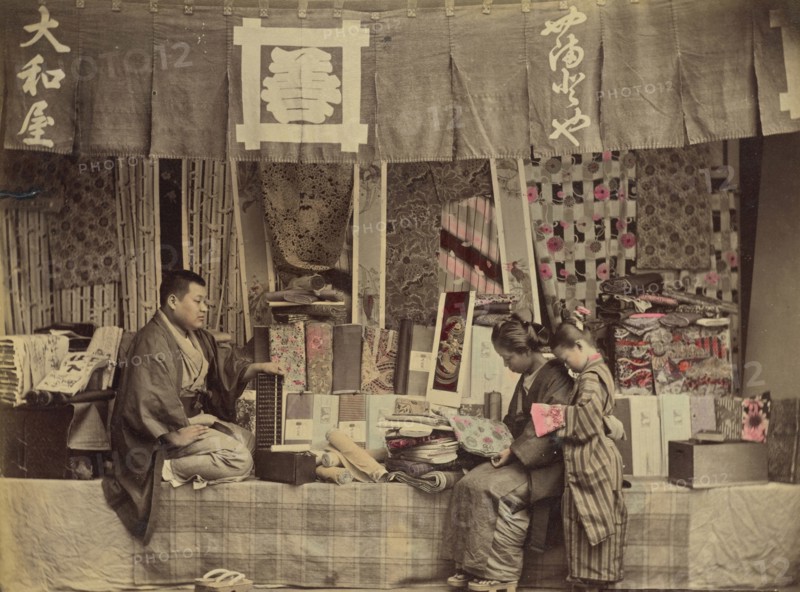 Cloth Store; Attributed to Kusakabe Kimbei, Japanese, 1841 - 1934, active 1880s - about 1912, Japan; 1870s - 1890s; Hand-
