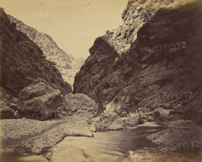 Three men beside river; John Burke, British, active 1860s - 1870s, Afghanistan; 1878 - 1879; Albumen silver print