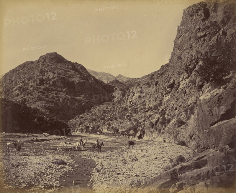 Two men on horseback near river; John Burke, British, active 1860s - 1870s, Afghanistan; 1878 - 1879; Albumen silver print