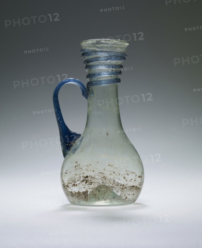 Pale Green Pitcher with blue trail and handle; Eastern Mediterranean; 4th - 5th century; Glass; 10.5 x 5.2 cm, 4 1,8 x 2 1,16 in