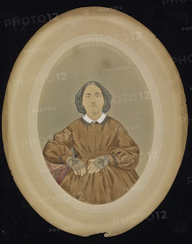 Portrait of a woman; American; about 1850 - 1860; Hand-colored salted paper print; 19 × 13.5 cm, 7 1,2 × 5 5,16 in
