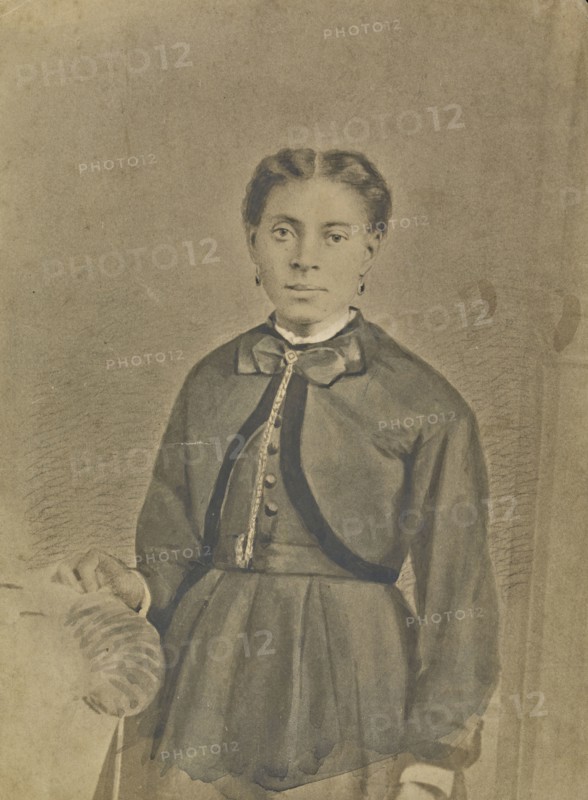 Portrait of a young woman; American; about 1850 - 1860; Hand-colored salted paper print; 22.6 × 17.4 cm, 8 7,8 × 6 7,8 in