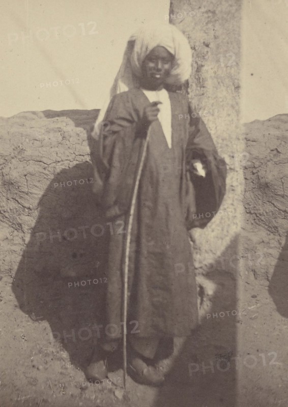 Portrait of a Young Native Man Standing Against a Pillar; Théodule Devéria, French, 1831 - 1871, France; 1865; Albumen silver