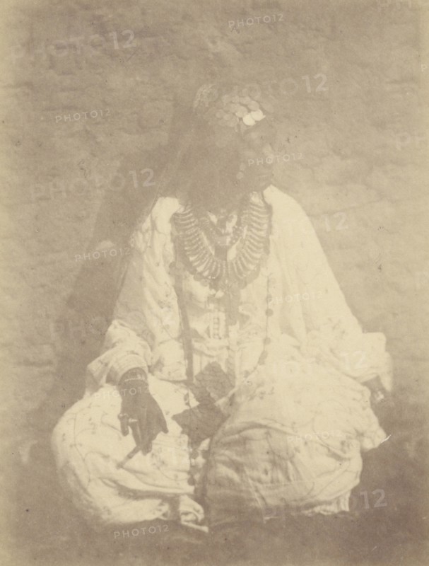 Portrait of a Native Woman Sitting Against a Wall; Théodule Devéria, French, 1831 - 1871, France; 1865; Albumen silver print