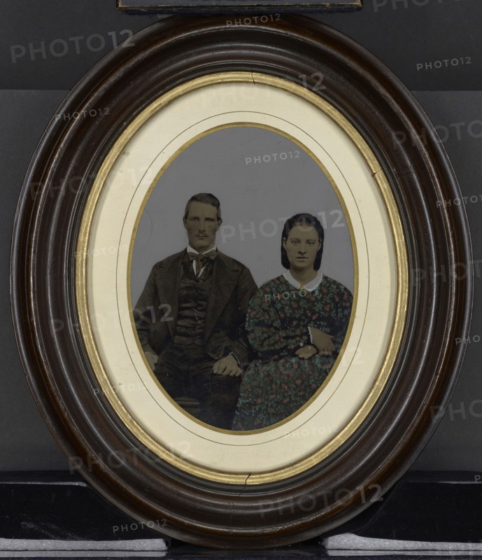 Portrait of young couple; United States; 1860s - 1880s; Hand-colored tintype; 18.9 × 14 cm, 7 7,16 × 5 1,2 in