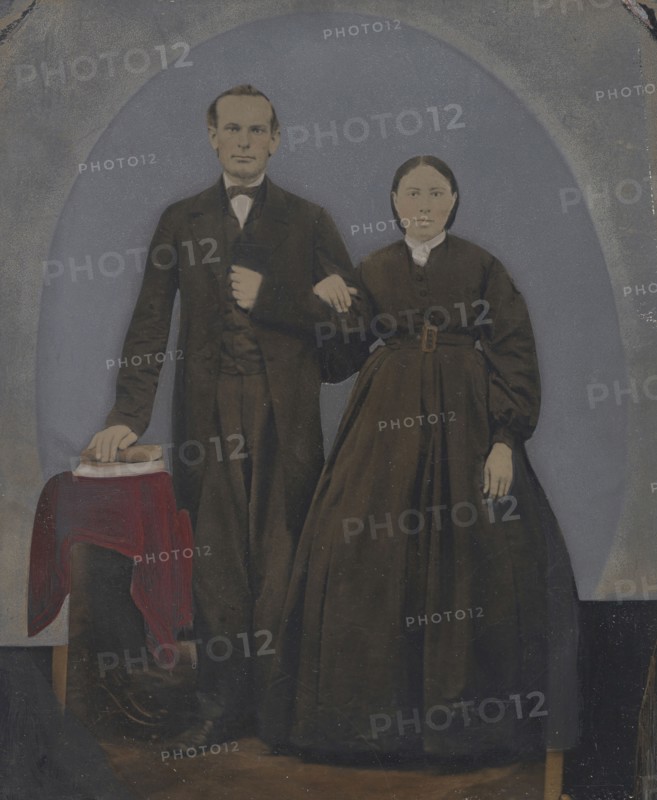 Portrait of standing couple; United States; 1860s - 1880s; Hand-colored tintype; Sheet: 25.5 x 20.1 cm, 10 1,16 x 7 15,16 in