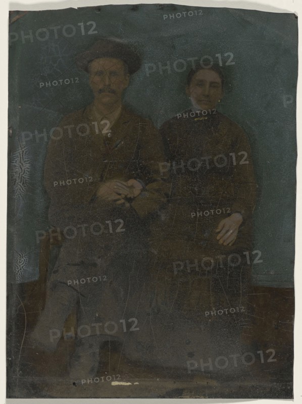 Portrait of couple; United States; 1860s - 1880s; Hand-colored tintype; Sheet: 20.2 x 14.9 cm, 7 15,16 x 5 7,8 in