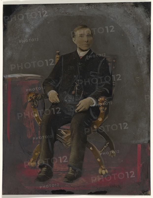 Portrait of seated man; United States; 1860s - 1880s; Hand-colored tintype; Sheet: 21.1 x 16.6 cm, 8 5,16 x 6 9,16 in