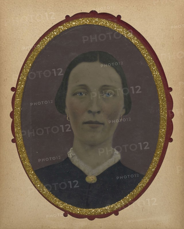 Portrait of woman; United States; 1860s - 1880s; Hand-colored tintype; Sheet: 21 x 16.1 cm, 8 1,4 x 6 5,16 in