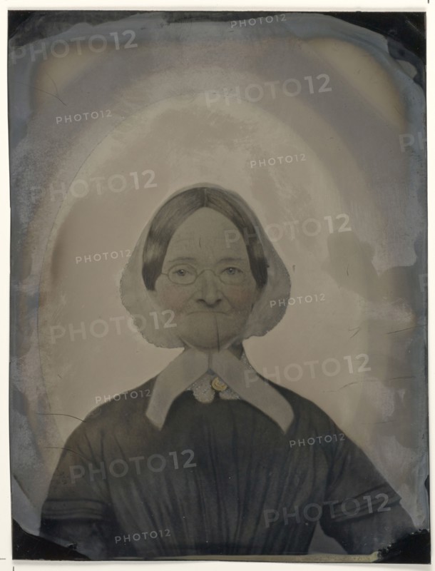 Portrait of old woman with glasses; United States; 1860s - 1880s; Hand-colored tintype; Sheet: 21.3 x 16.2 cm, 8 3,8 x 6 3,8 in