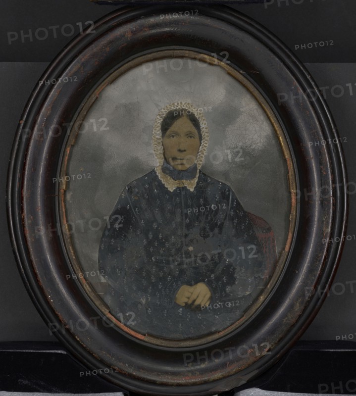 Portrait of woman in bonnet; United States; 1860s - 1880s; Hand-colored tintype; 23.8 × 19 cm, 9 3,8 × 7 1,2 in
