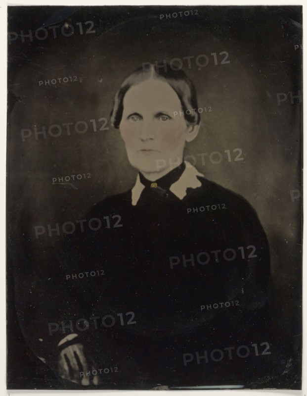 Portrait of woman; United States; 1860s - 1880s; Hand-colored tintype; Sheet: 21.6 × 16.5 cm, 8 1,2 × 6 1,2 in