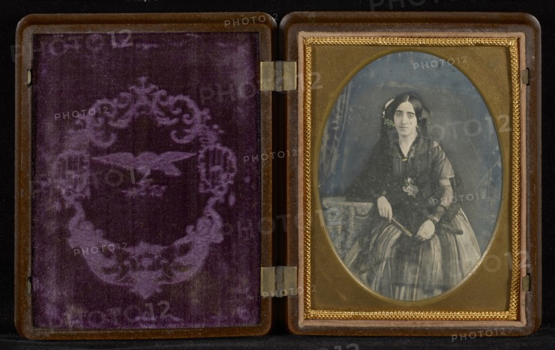 Portrait of Woman in Black with Fan; Mexico; about 1850s; Hand-colored Daguerreotype