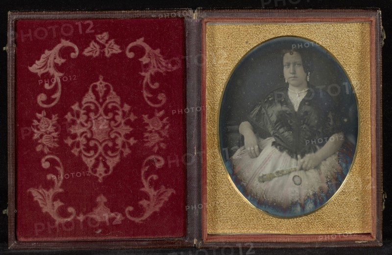 Portrait of a Woman in a Black Jacket Holding a Fan; Mexico; about 1850s; Hand-colored Daguerreotype