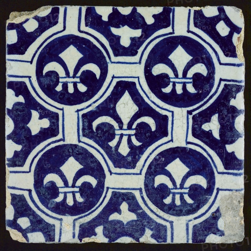 Ornament tile with French lily decor, wall tile tile sculpture ceramics pottery glaze, baked 2x glazed painted Yellow to reddish