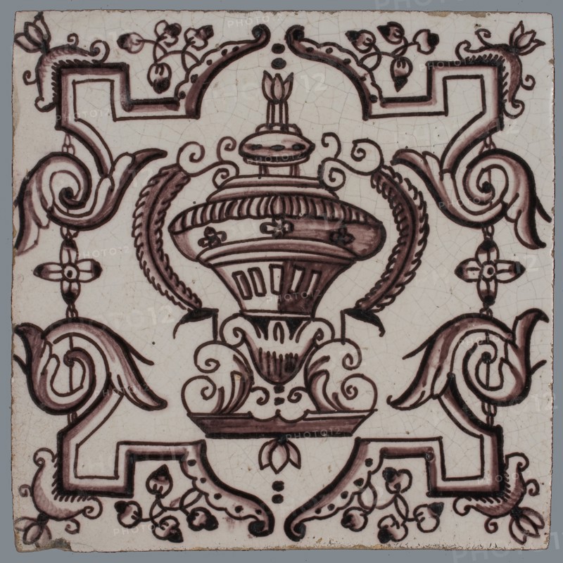 Tile, purple on white, vase with round floral ornaments, framed by régence decoration, wall tile tile sculpture ceramic